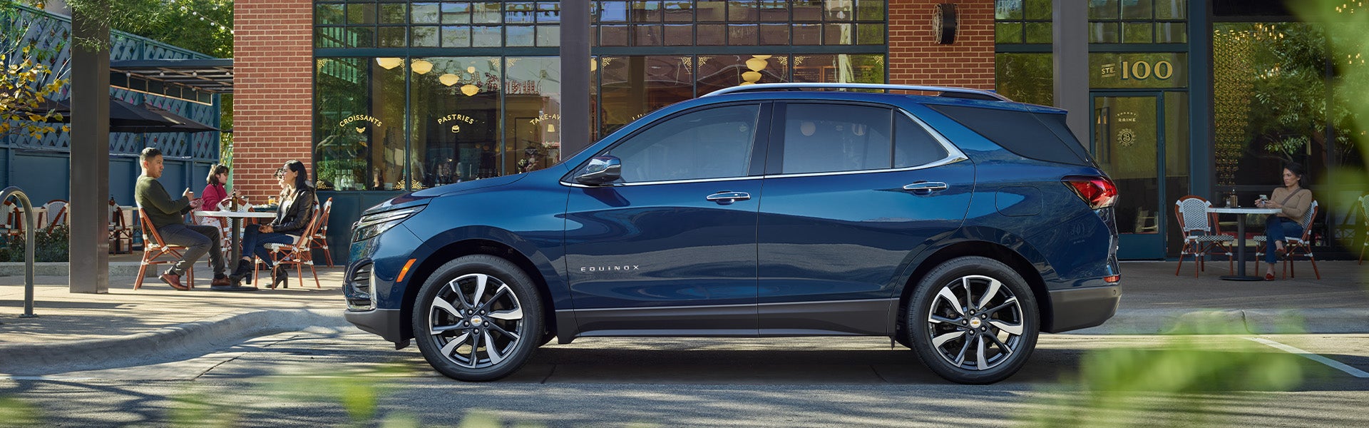2023 Chevy Equinox parked by cafe