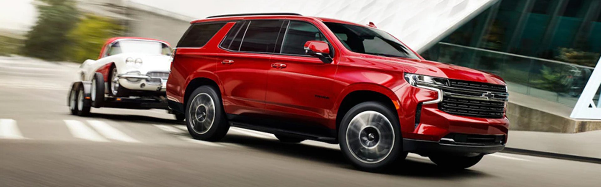 2024 Chevrolet Tahoe Towing Car On Highway